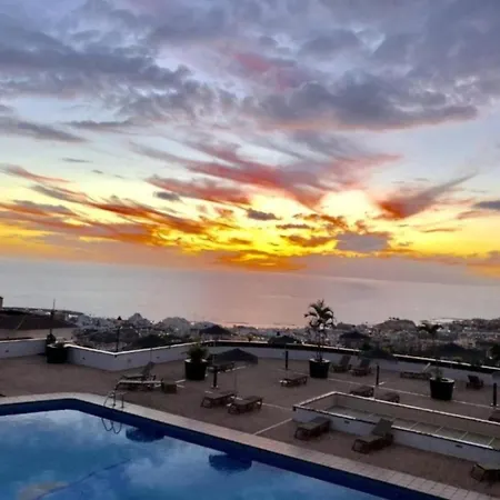 The Sunset Адехе